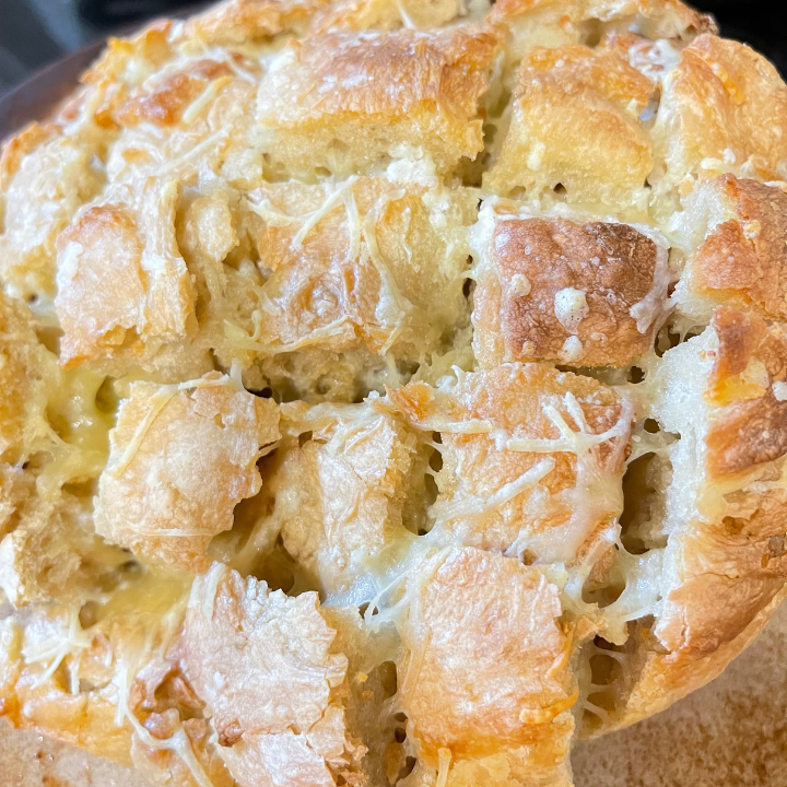 up close picture of garlic stuffed cheese sourdough bread